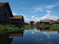 Village on the lake - notice there is a floating garden complete with tomatoes!