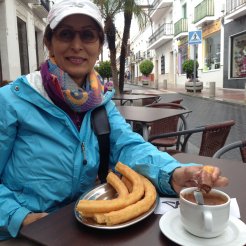 Caroline trying the traditional Churros and Chocolate