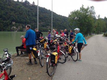 Cyclists on a riverside break