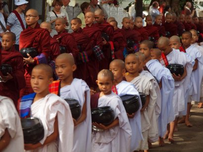 monks of all ages waiting for their only meal of the day